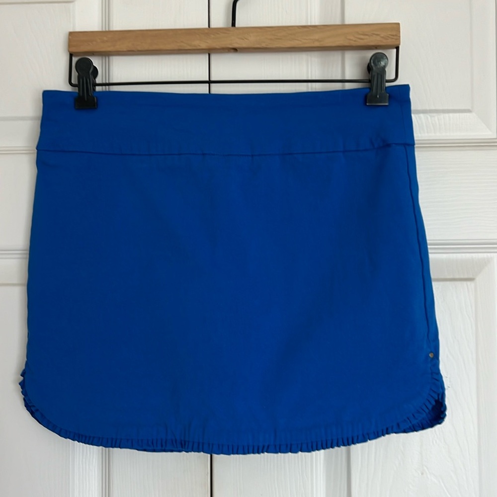 Bright blue petite skort with shorts.